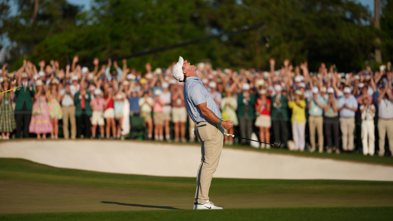 Rory McIlroy celebrates his Masters victory on the 18th green