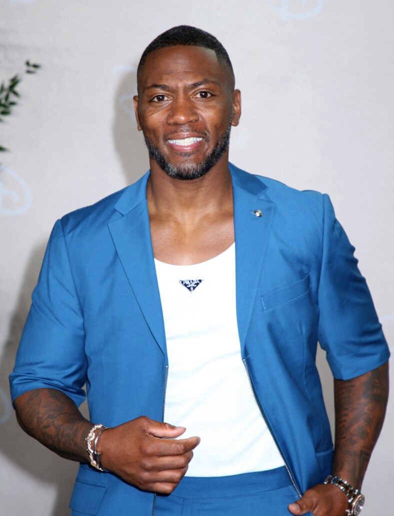 Ryan Clark posing on the red carpet.