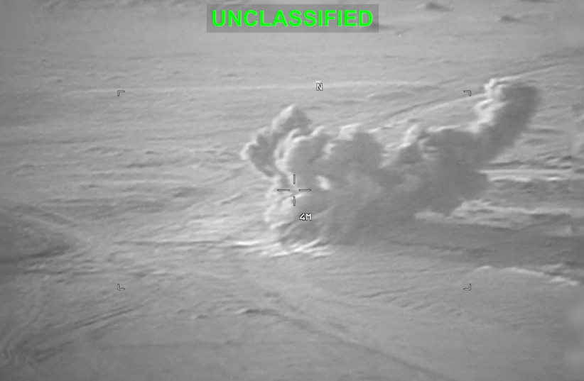 Smoke rises from an explosion at an unknown location, during what US Central Command (CENTCOM) says are strikes on Iran, in this still image taken from a handout video released on July 19, 2026. (credit: US CENTRAL COMMAND/HANDOUT VIA REUTERS)
