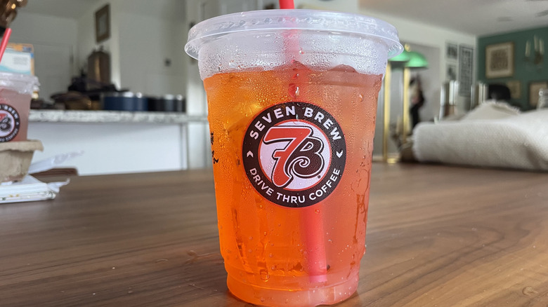 Blood orange soda in a cup on a table