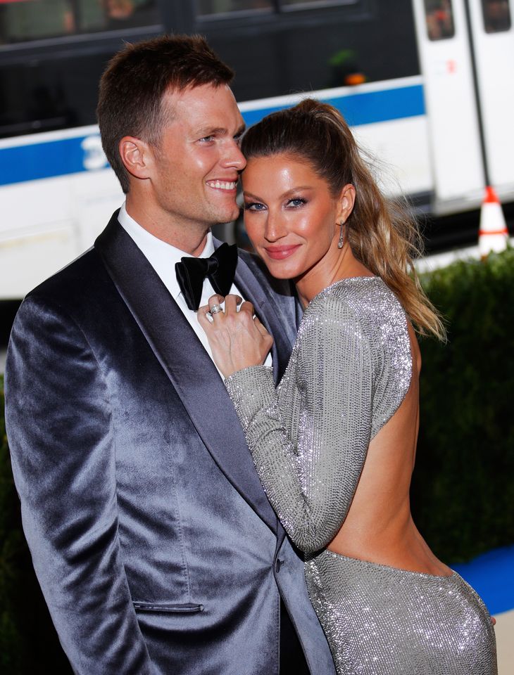 Tom Brady and Gisele Bndchen posing together at an event