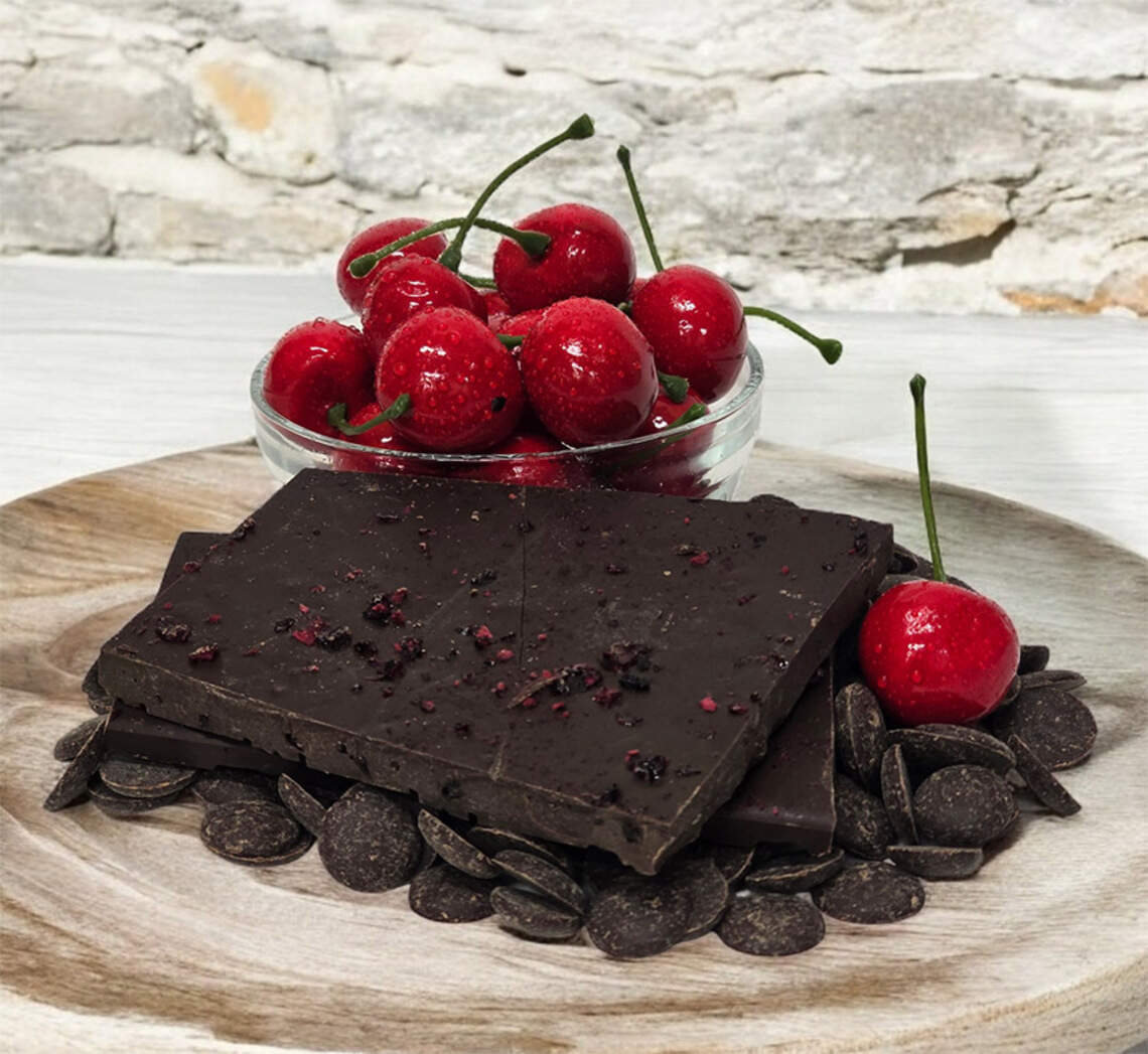 Their Cherry Noir 72 Dark hosts cherry inclusions in a dark chocolate bar.