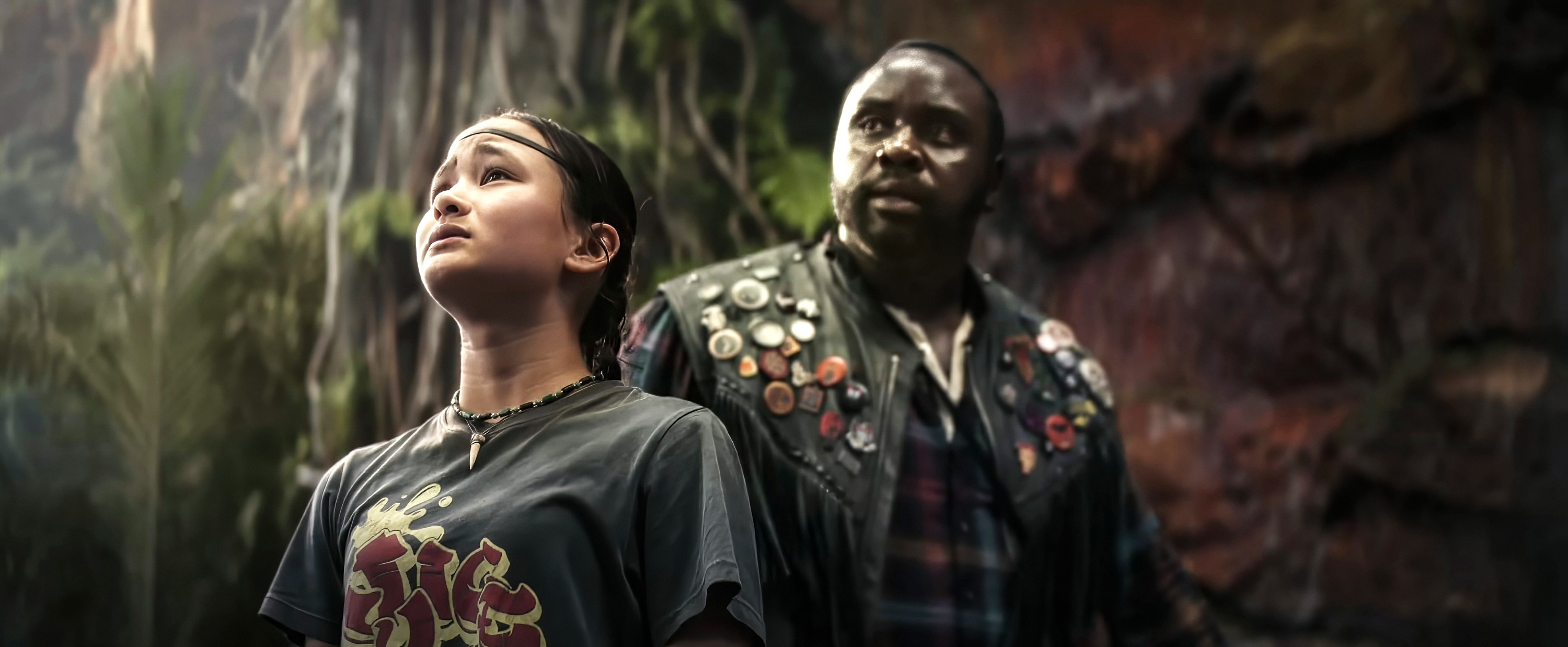 Kaylee Hottle and Brian Tyree Henry looking up in 