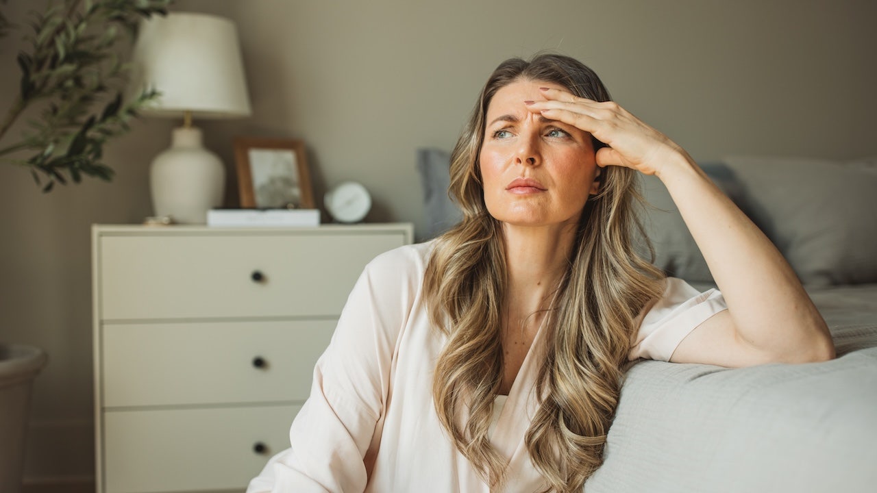 Woman with menopause symptoms