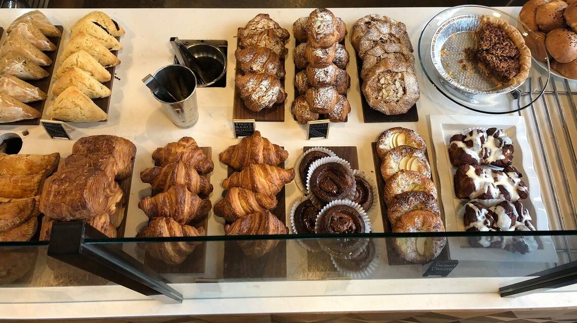 Ethos Bakery offerings include breakfast sandwiches, pastries toasts and more.