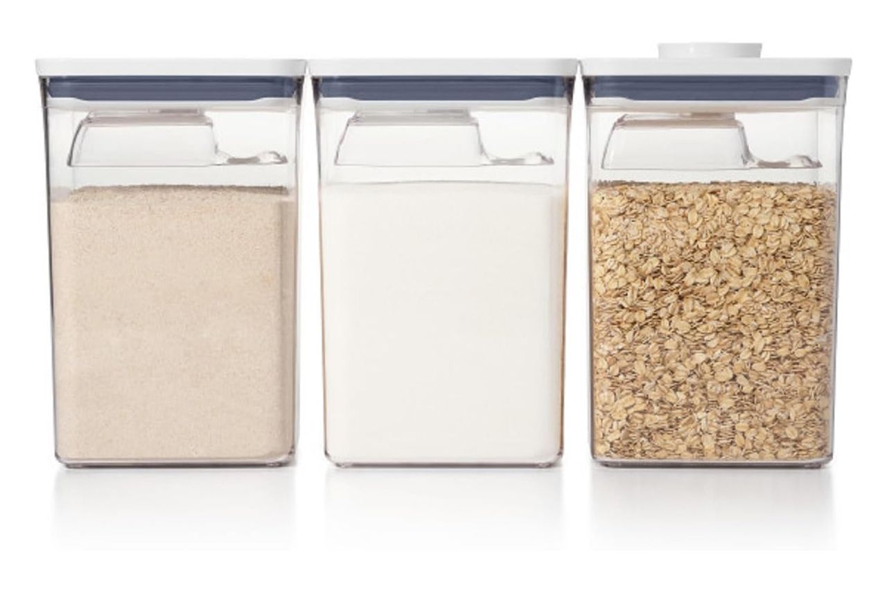 Three transparent containers with different food storage contents