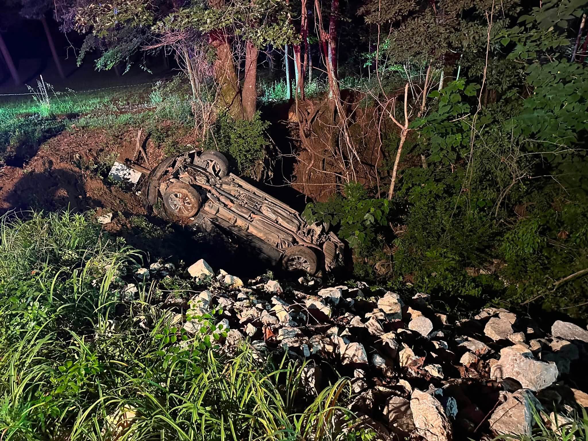 Multiple agencies respond after car crashes into ravine