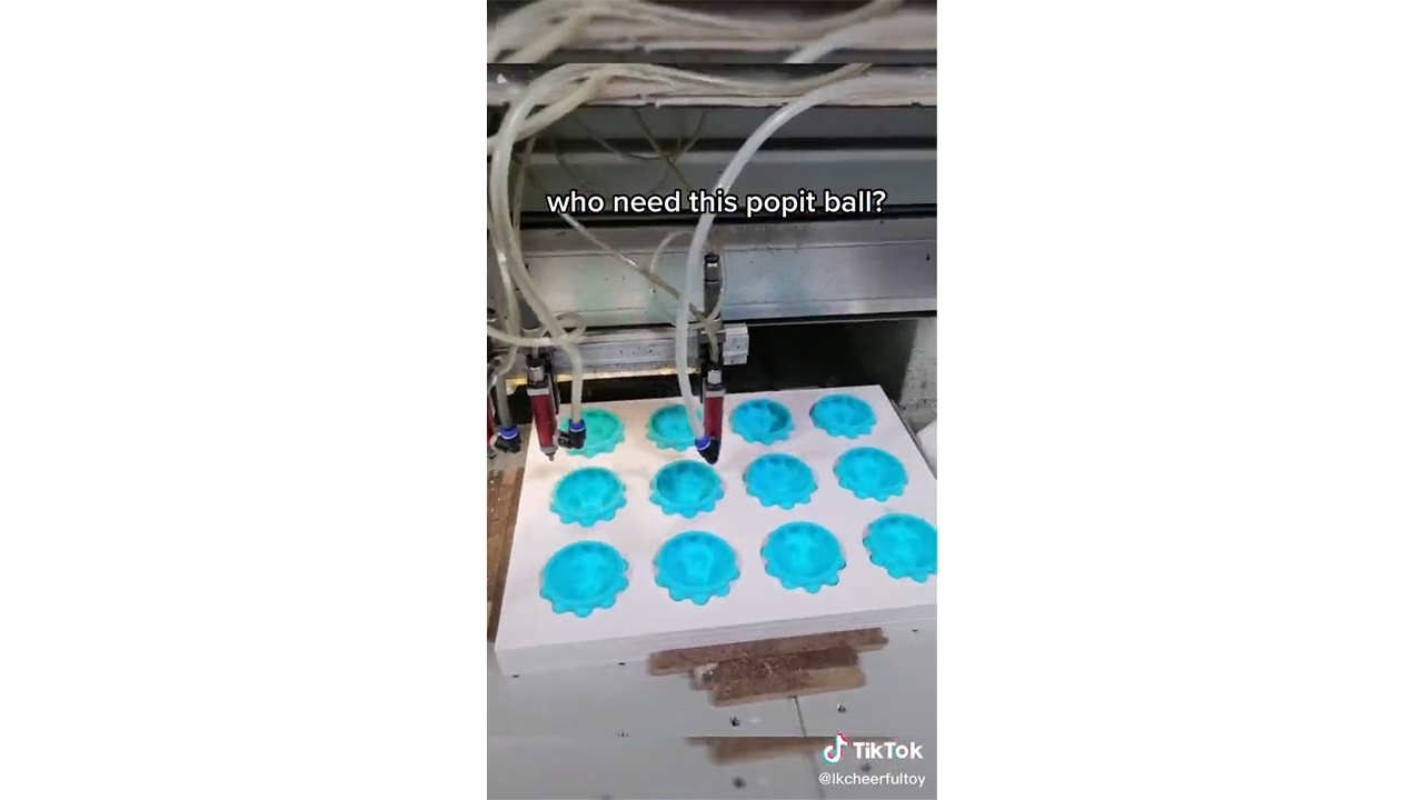 Creating soft bubble pop it balls through an automated factory process