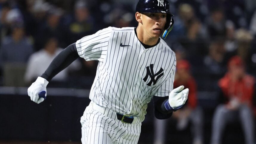 Yankees infielder George Lombard Jr. runs after a spring training hit