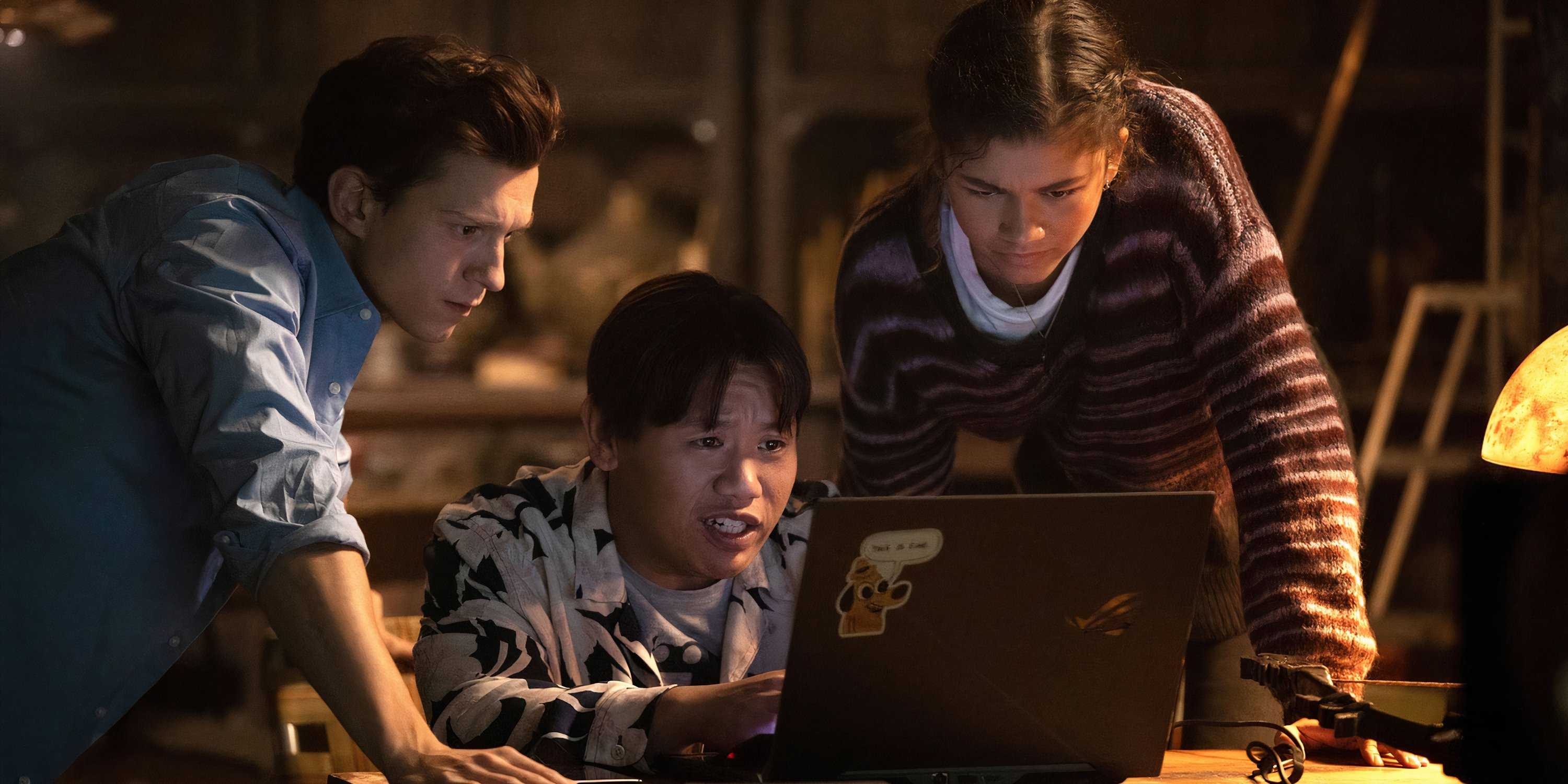 Ned works on the laptop with his friends in Spider-Man: No Way Home