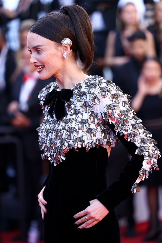 Charlotte Le Bon posing on the red carpet at an event