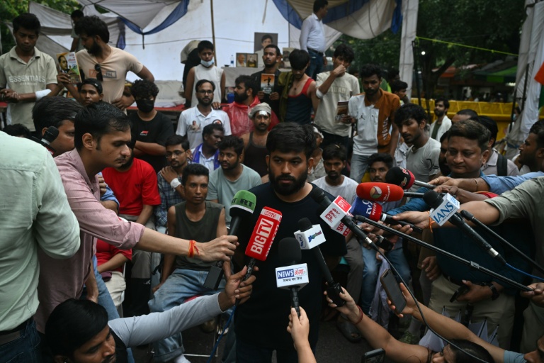 Cockroach Janta Party (CJP) founder Abhijeet Dipke speaks to the media during a protest in New Delhi