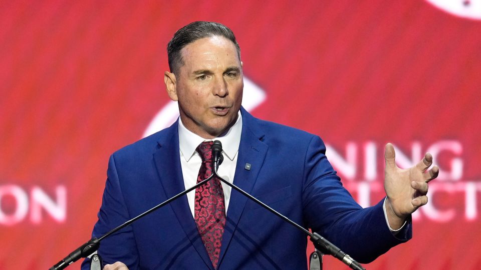 Former NFL football kicker Jay Feely speaks at a Turning Point USA event in Phoenix, Arizona, on April 17, 2026. - Ross D. Franklin/AP