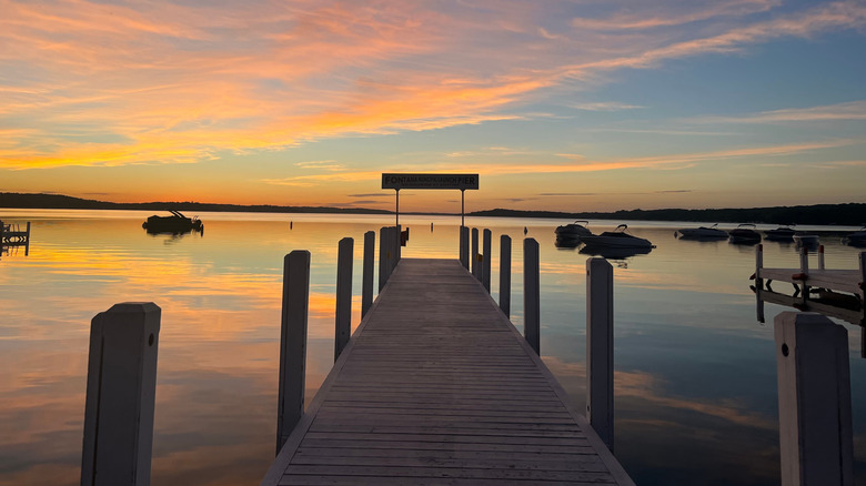 Sunrise over a dock in Geneva Lake, Wisconsin