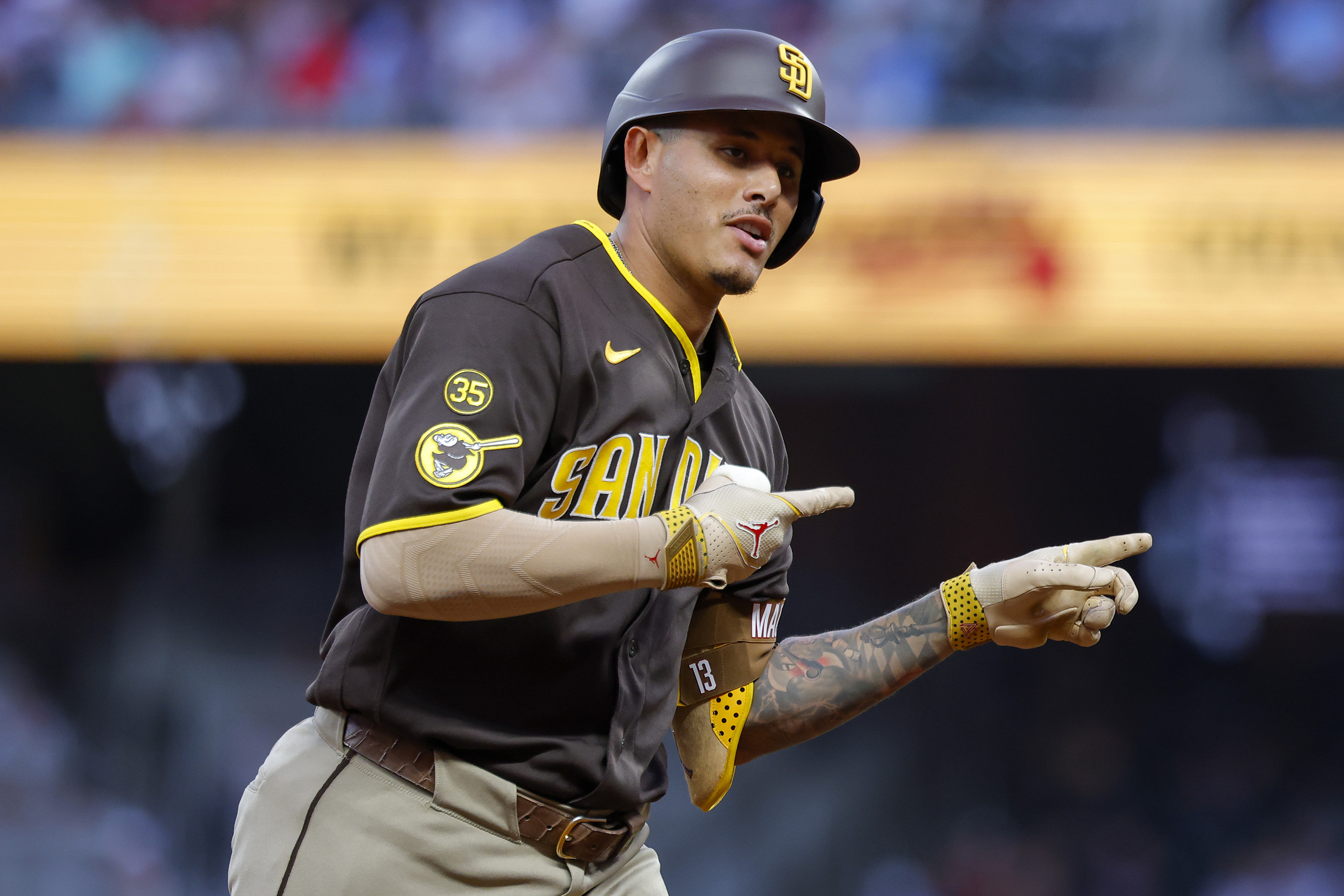 Manny Machado homers twice, Walker Buehler rebounds as Padres even series against Braves