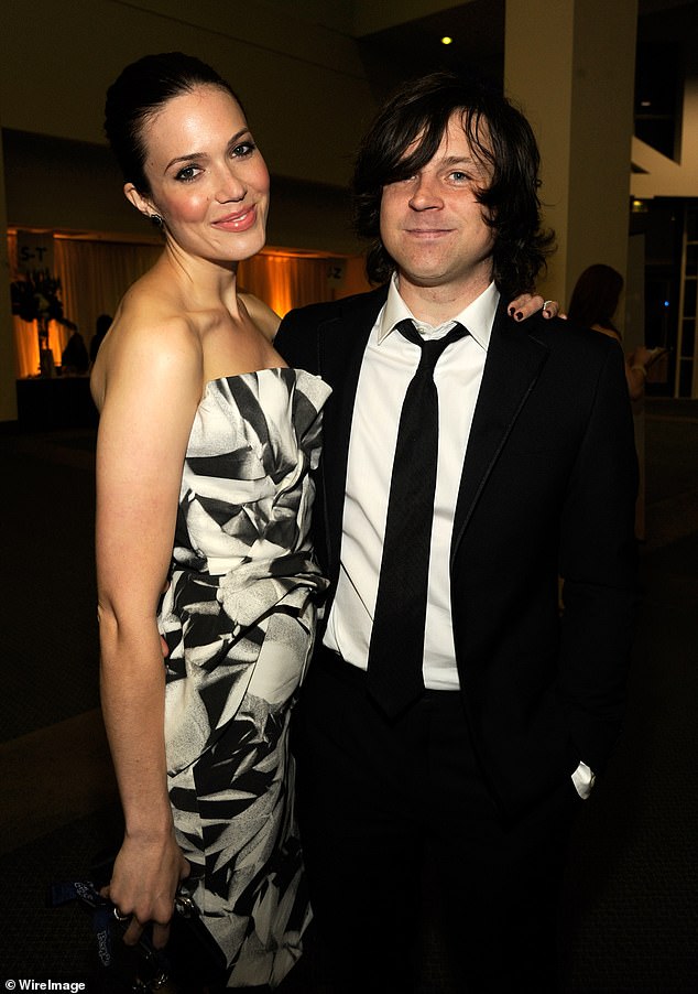 Rock musician Ryan Adams, the ex-husband of actress Mandy Moore, revealed Monday that he had been forced to cancel his upcoming European tour amid a debilitating health battle; Adams and Moore are pictured in 2012 in LA