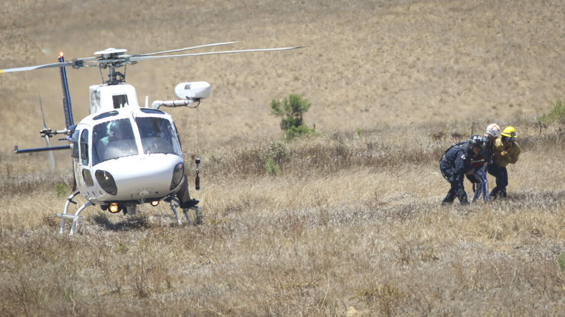 A California Highway Patrol helicopter assisted San Luis Obispo Fire Department at Bishop Peak to rescue a hiker in distress on July 21, 2026.