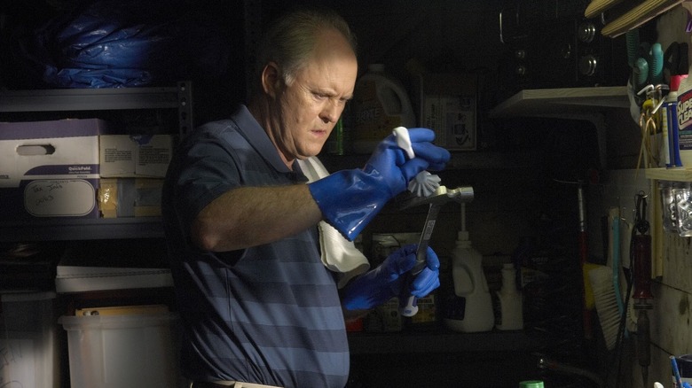 Arthur Mitchell preparing a weapon on Dexter
