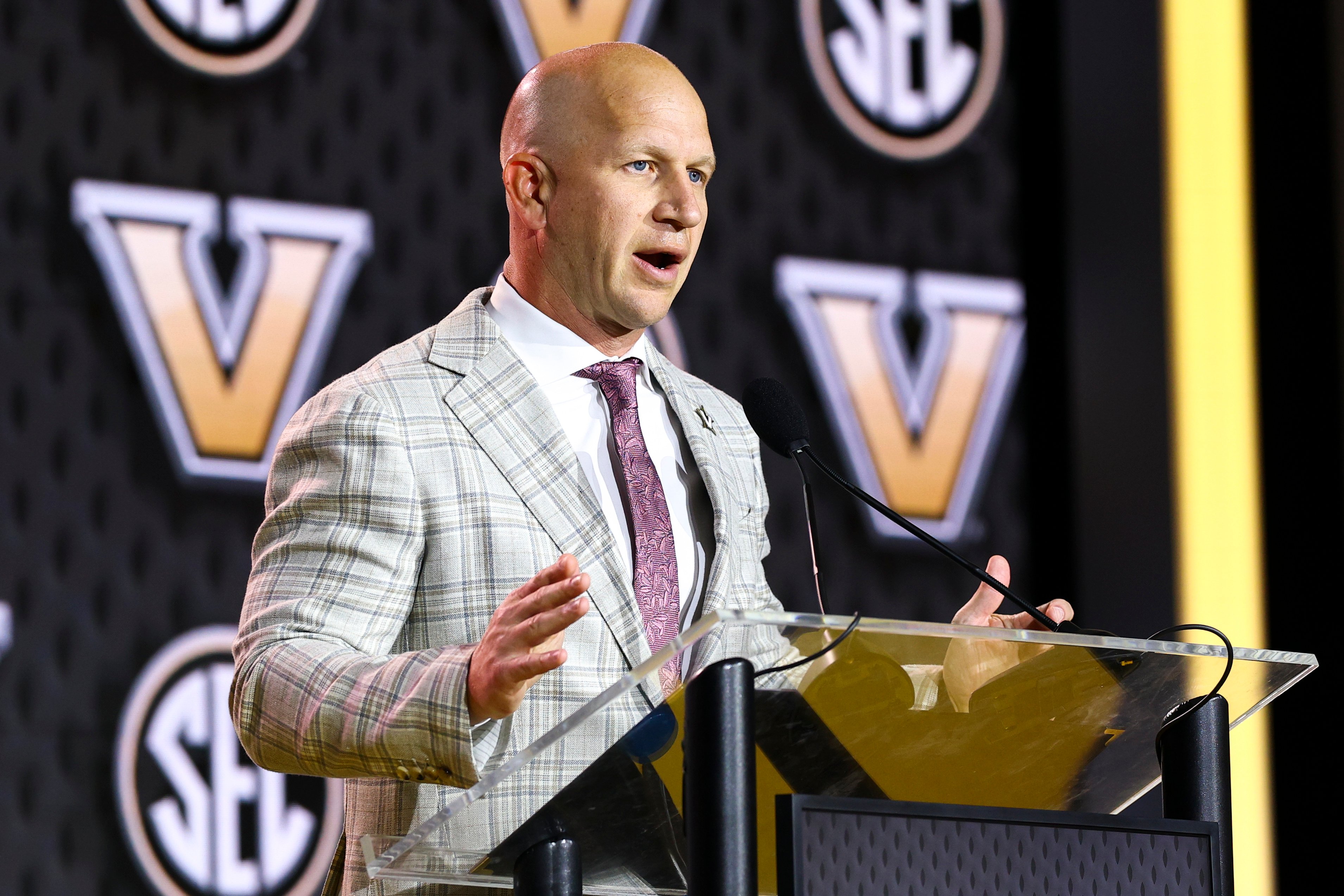 Jul 21, 2026; Tampa, FL, USA; Vanderbilt Commodores head coach Clark Lea speaks to the press during SEC Football Kickoff Media Day at the Tampa Marriott. Mandatory Credit: Nathan Ray Seebeck-Imagn Images