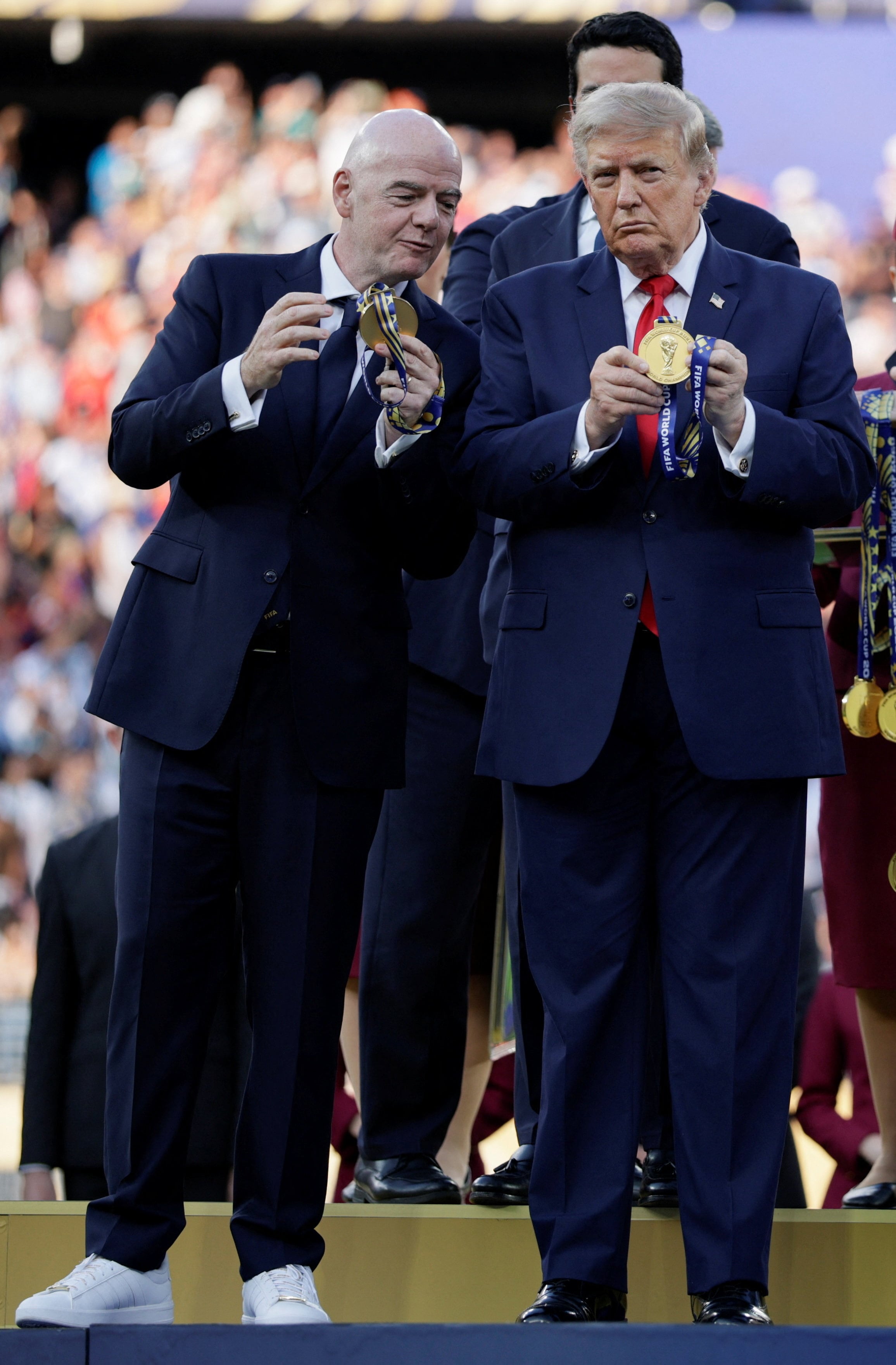 Infantino landed in hot water after Trump acknowledged he pushed the FIFA president to revisit a red card decision that threatened to keep U.S. star Folarin Balogun out of the knockout clash with Belgium, ultimately leading to the suspension being overturned. / Evan Vucci/REUTERS