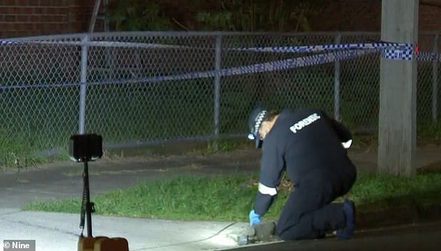 Detectives and forensic officers spent Tuesday night examining the crime scene
