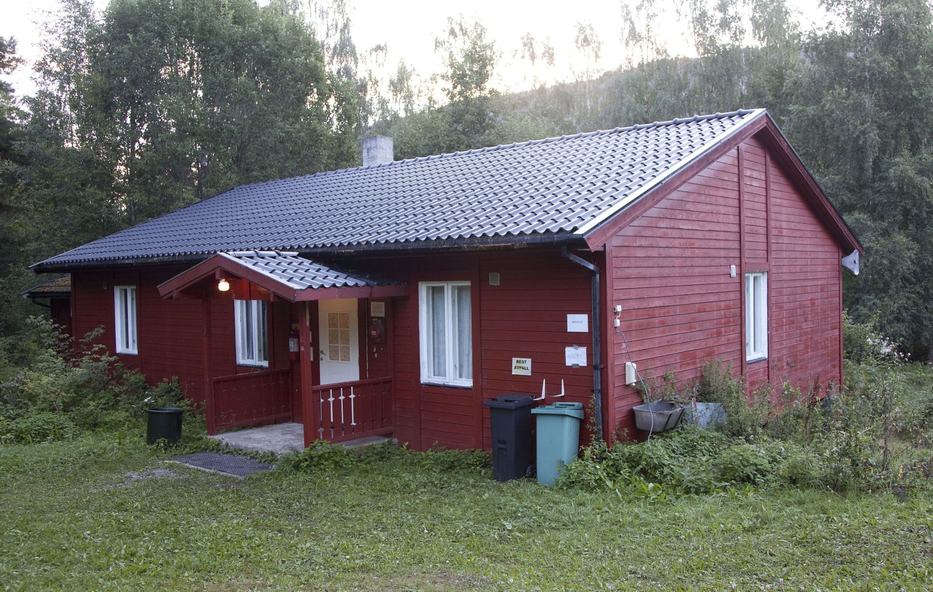 The school building where students barricaded themselves in with tables. It is a dark red building.