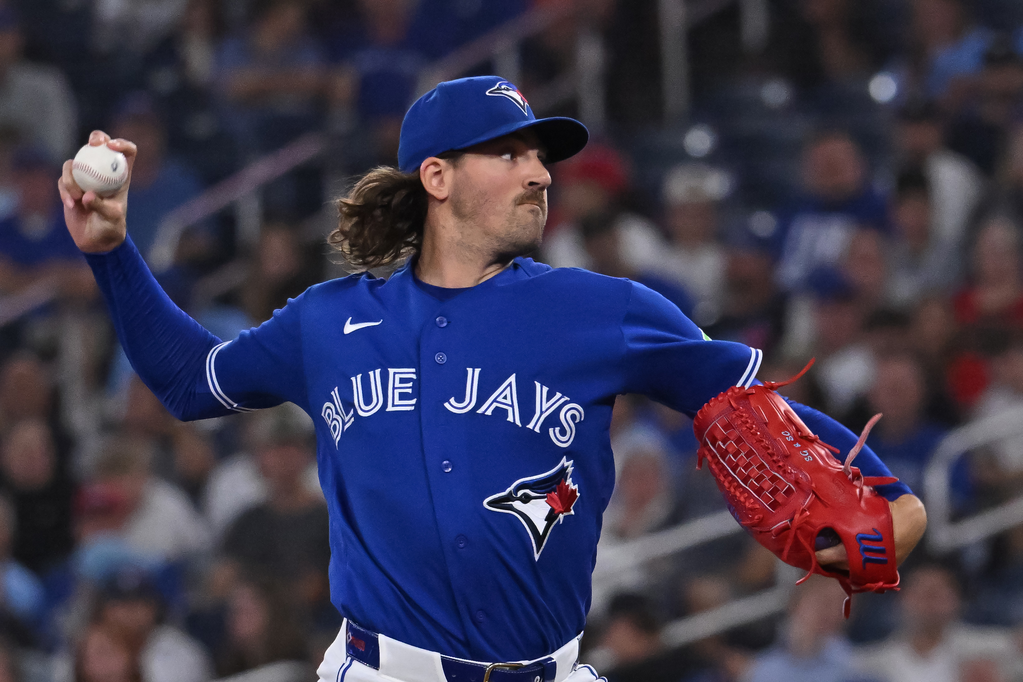 Toronto Blue Jays pitcher Kevin Gausman throws to a Tampa Bay Rays batter during during the first inning of a baseball game in Toronto on Tuesday, July 21, 2026. (Jon Blacker/The Canadian Press via AP)