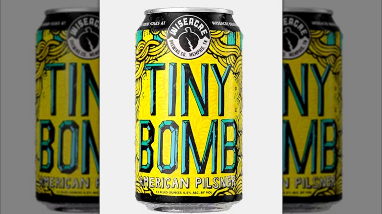 Can and glass of Wiseacre Tiny Bomb American Pilsner