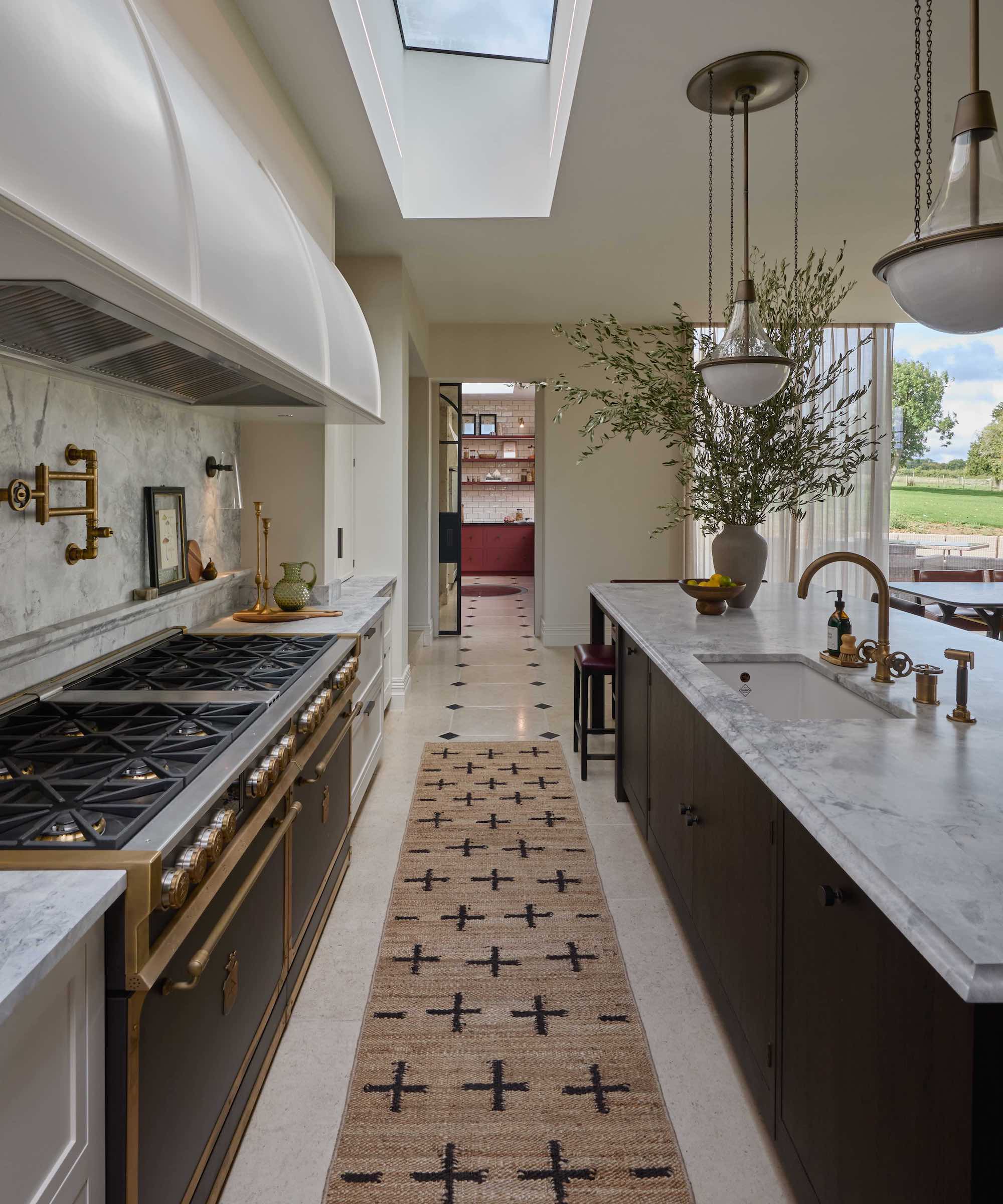 kitchen with large range and jute runner