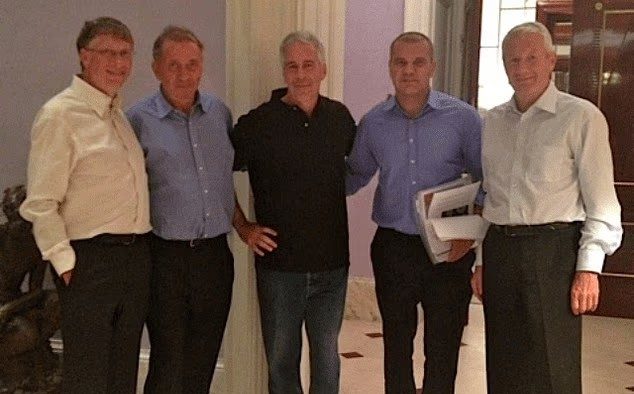 Mr Gates (left) pictured with Epstein (centre)