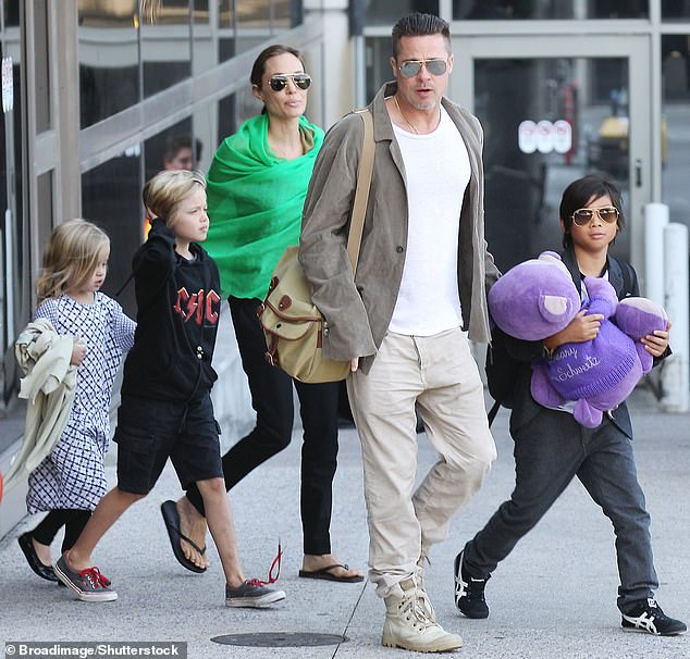 During their high-profile 'Brangelina' years, the pair welcomed six children before embarking on a bitter, eight-year divorce battle that was officially finalized in 2024. Pictured in 2014
