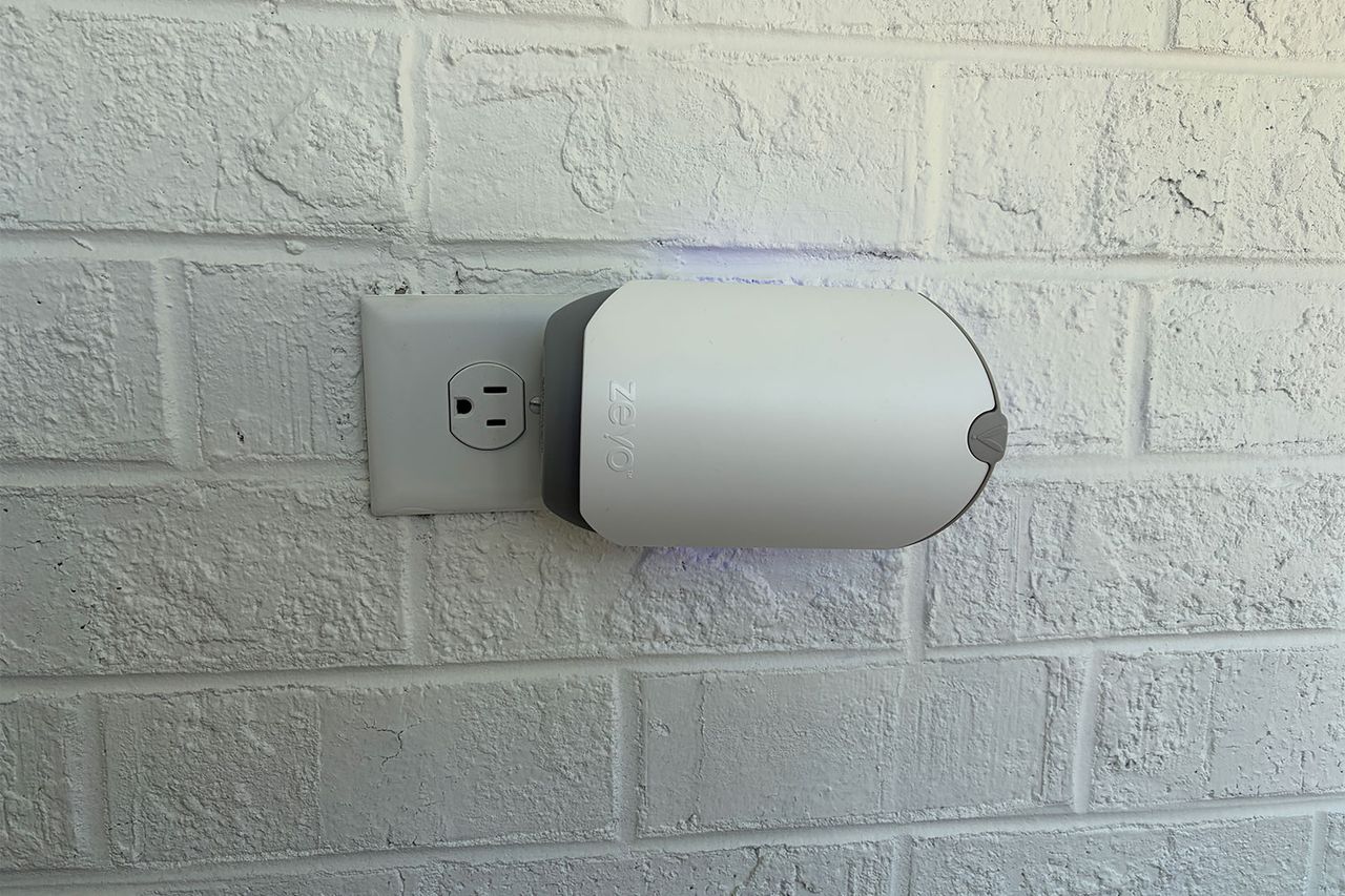 Wallmounted flying insect trap plugged into an outlet