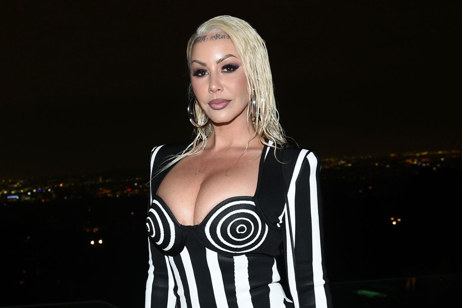 Amber Rose sues Beverly Hills social club after she says a holiday ornament fell on her head, causing hospitalization and concussion