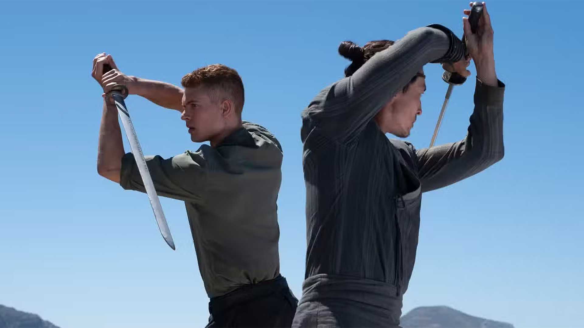 Lan and Rand train with swords in The Wheel of Time.