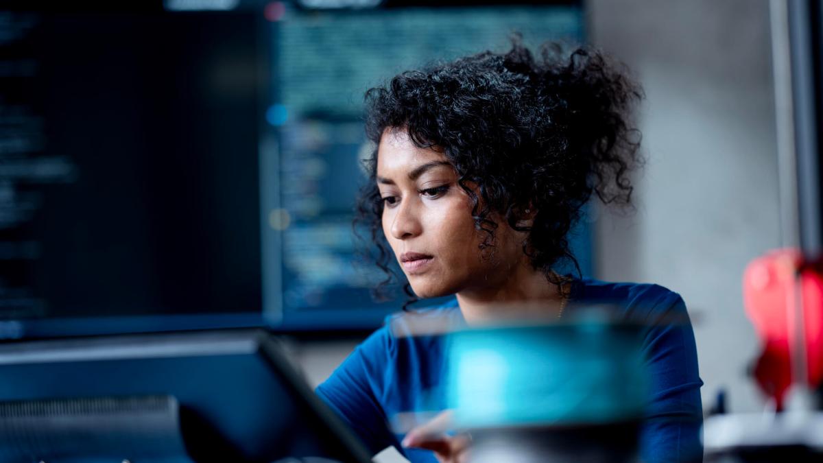 An image showing a woman working