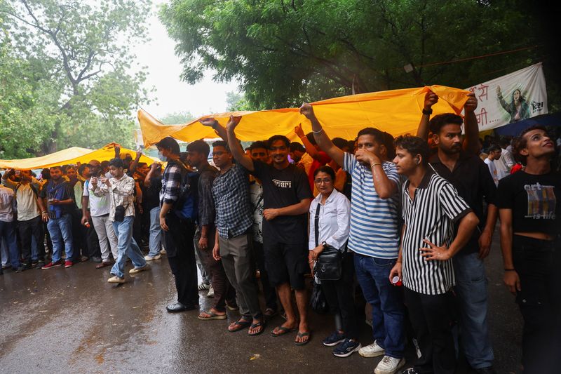 Supporters of India's Cockroach Janta Party (CJP) demonstrate at a protest site in New Delhi