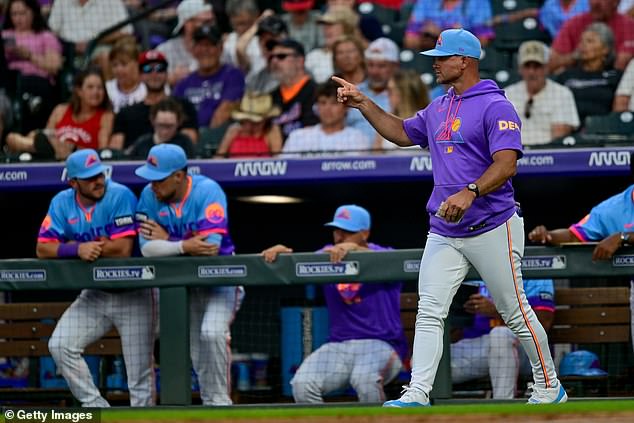 Rockies manager Warren Schaeffer signals to the bullpen before a recent game. He and his staff were allegedly recorded in the dugout by an Angels scout earlier this season