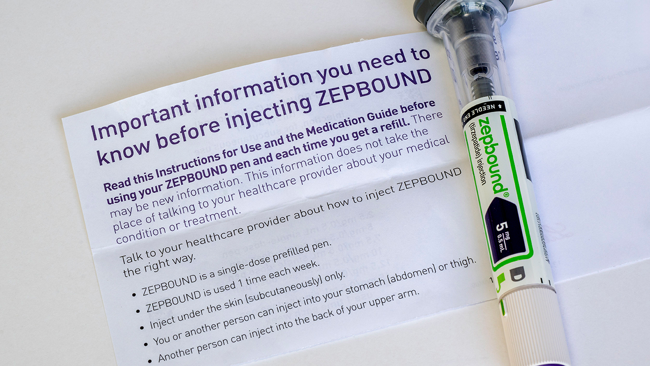 photo illustration of Zepbound with instruction sheet on a white background. It is an injectable medication used for chronic weight management