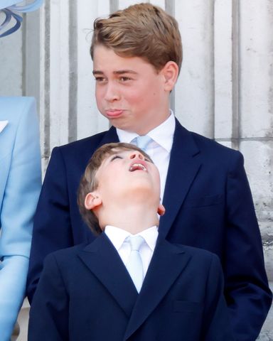 Prince George of Wales and Prince Louis of Wales watch an RAF flypast from the balcony of Buckingham Palace after attending Trooping The Colour 2026 on June 13, 2026 in London, England.