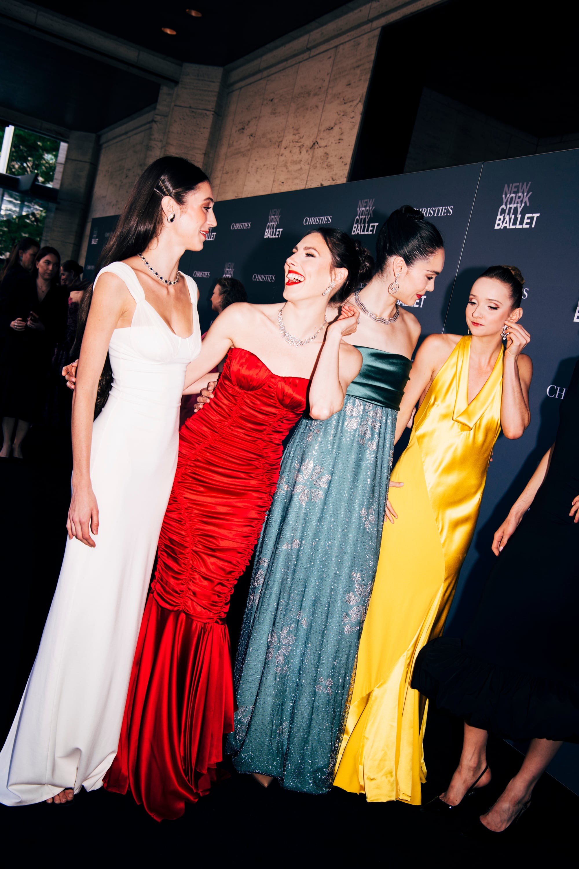 Lauren Collett, Tiler Peck, Mira Nadon and Emma Von Enck laugh with one another at the New York City Ballet 2026 Spring Gala at Lincoln Center on May 7, 2026, in New York City. / WWD / WWD via Getty Images