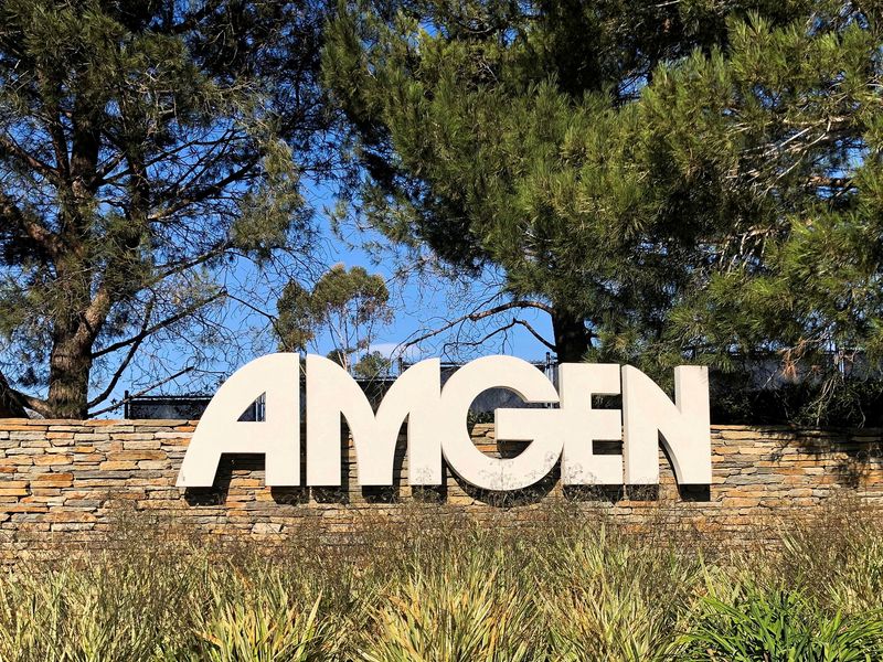 FILE PHOTO: FILE PHOTO: An Amgen sign is seen at the company's headquarters in Thousand Oaks