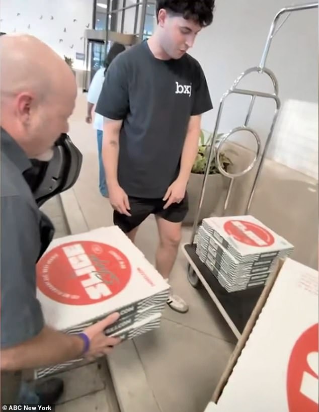 Delivery drivers needed to use a luggage dolly to help wheel in the monstrous order