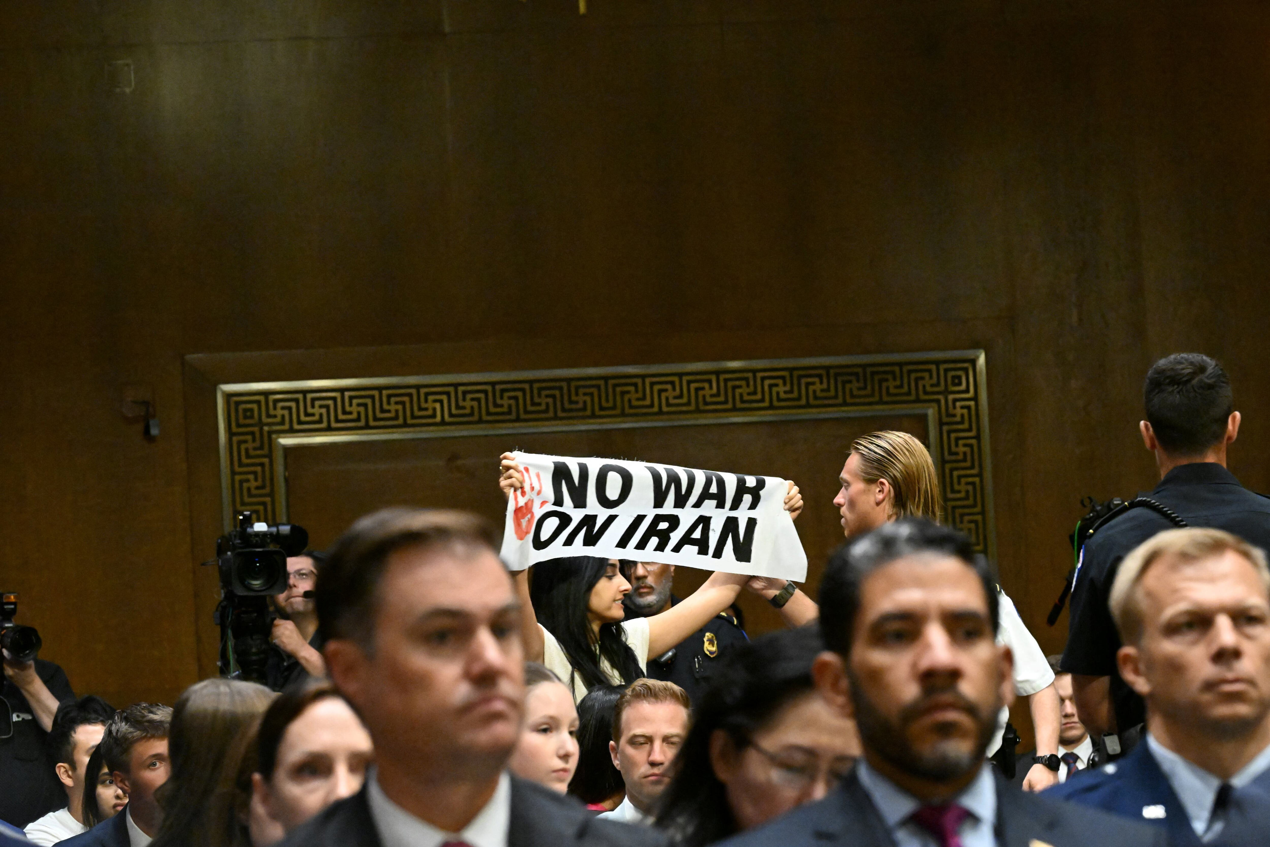 The hearing with Hegseth was interrupted by several protesters who were removed from the room by Capitol Police. / Alex Wroblewski/AFP via Getty Images