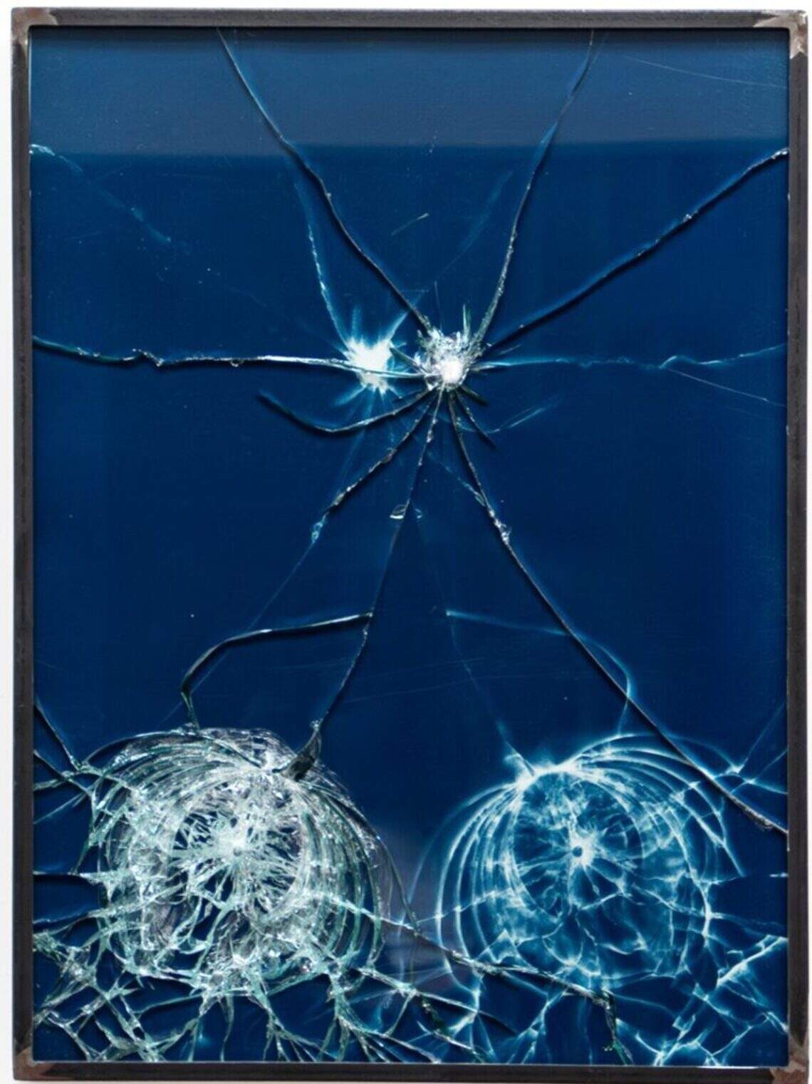 Antonia Wright, “OK,” 2026, cyanotype, broken glass, artist steel frame.
