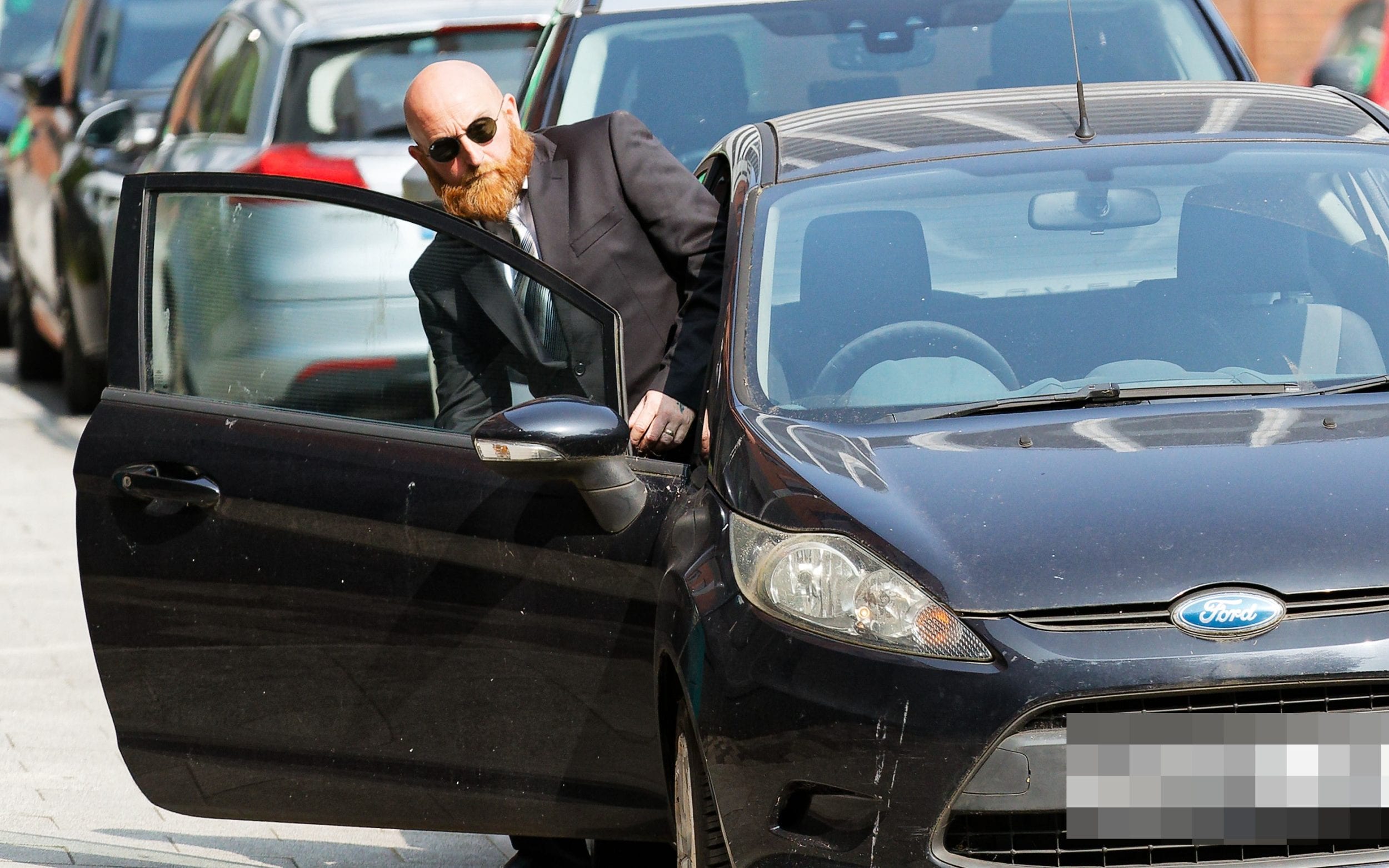 Neil Lewis leaves Cardiff magistrates' court