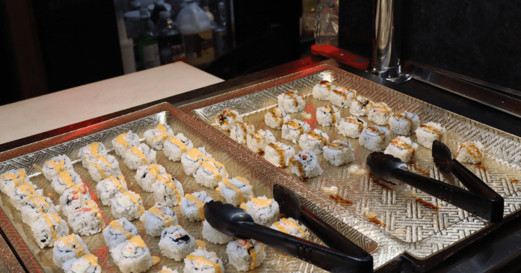 Freshly prepared sushi rolls with spicy mayo at Golden Palace Buffet in Livonia, MI.