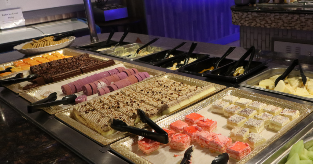 Assorted cakes, pastries, and brownies at Golden Palace Buffet, Livonia, MI dessert bar.