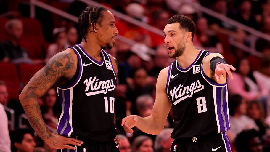 Sacramento Kings forward DeMar DeRozan talks with guard Zach LaVine