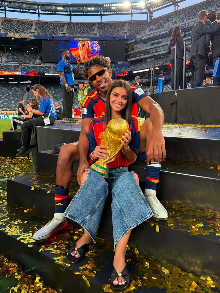 Lamine Yamal with his girlfriend Inés García on the field at MetLife Stadium.