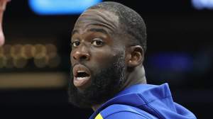 Draymond Green #23 (R) of the Golden State Warriors